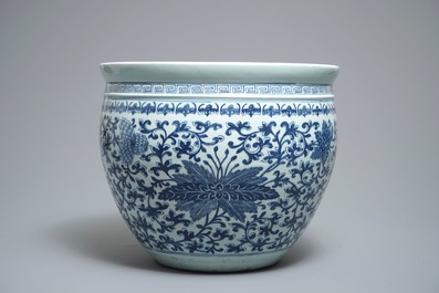 A Chinese blue and white fish bowl with bats and flowers, 19th C.