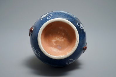 A Chinese blue and white powder blue-ground hu vase with landscape medallions, 19/20th C.