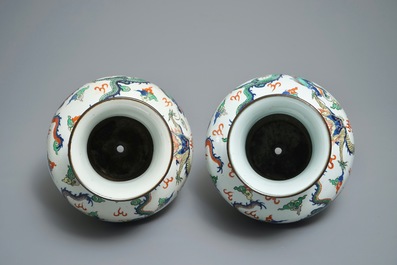 A pair of Chinese wucai dragon vases, Wanli mark, 19th C.