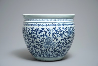 A Chinese blue and white fish bowl with bats and flowers, 19th C.