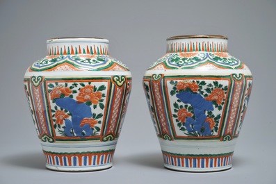 Two Chinese wucai vases with peony flowers on rockwork, 19th C.