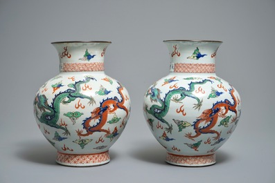 A pair of Chinese wucai dragon vases, Wanli mark, 19th C.