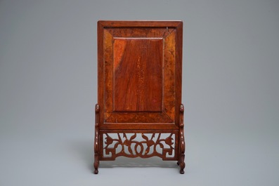 A small Chinese famille rose rootwood table screen, 19/20th C.
