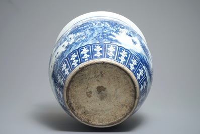 A Chinese blue and white fish bowl with a river landscape, 19th C.