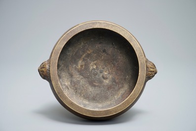 A Chinese bronze censer on wooden stand, Xuande mark, 18th C.