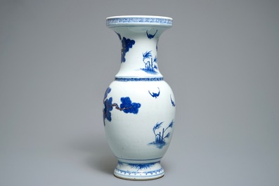 A Chinese blue, white and iron red vase with deer, 19/20th C.