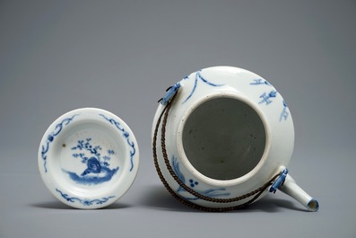 A large Chinese blue and white 'elephant parade' teapot and cover, 19th C.