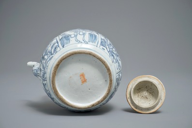 A Chinese blue and white kraak porcelain wine jug and cover with precious objects and flowers, Wanli