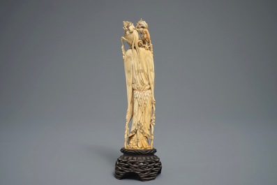 A Chinese carved ivory figure of an immortal with mythical beasts, 19th C.