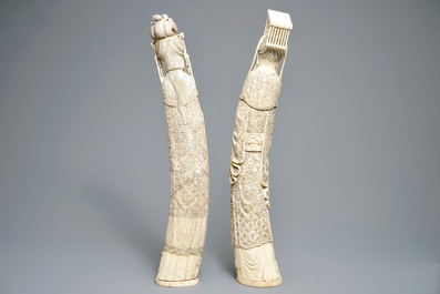 A pair of large Chinese ivory figures of an emperor and his wife, 19th C.