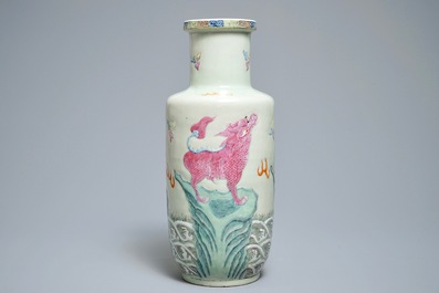 A Chinese famille rose rouleau vase with applied design of mythical beasts, Qianlong mark, 19th C.