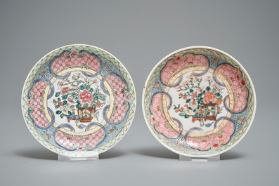 A pair of Chinese famille rose eggshell cups and saucers with overglaze floral design, Yongzheng