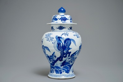 A Chinese blue and white vase and cover with mythical beasts, Kangxi