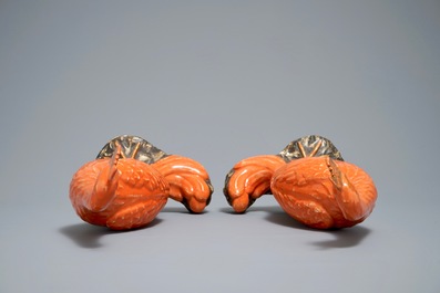 A pair of Chinese coral-ground models of phoenixes, 19/20th C.