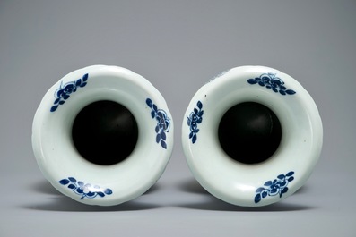 A pair of Chinese blue and white vases with figurative medallions, 19th C.