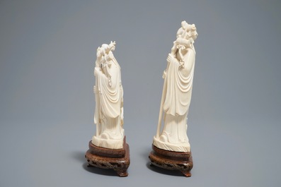 Two Chinese carved ivory figures of sages on wooden stands, 1st half 20th C.