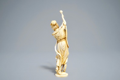 A Japanese ivory okimono of the goddess Kannon holding a fenghuang wing, signed, Meiji, 19th C.