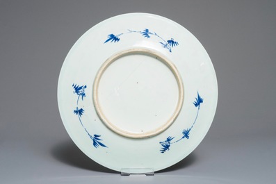 A Chinese blue and white 'phoenix' dish and an oval landscape dish, 19th C. and Qianlong