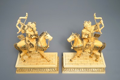 A pair of large Chinese inlaid ivory models of warriors on horseback, 19th C.