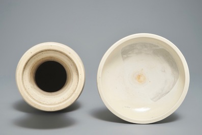 A Chinese monochrome cream-glazed vase and a tripod censer, Ming