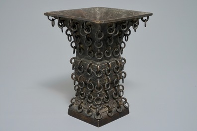 A Chinese archaistic ringed bronze fanggu vase, Ming