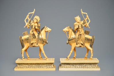 A pair of large Chinese inlaid ivory models of warriors on horseback, 19th C.