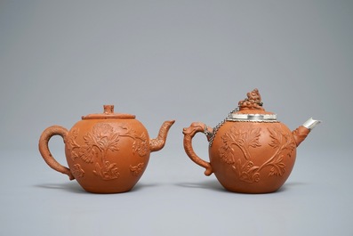 Two Chinese Yixing stoneware teapots with applied floral design, Kangxi