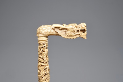 A fine Chinese carved ivory cane with dragon handle, Canton, 19th C.