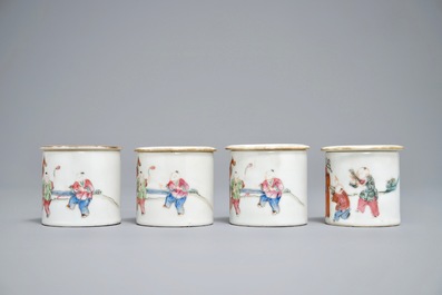 Four cylindrical Chinese famille rose covered boxes, 19th C.