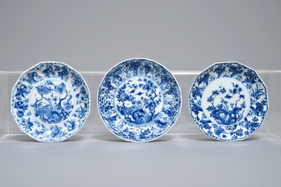 Twelve Chinese blue and white cups and saucers with floral design, Kangxi