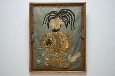 A Japanese silk embroidery depicting a rooster on an o-daiko drum, Edo or Meiji, 19th C.