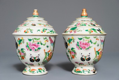 A pair of Chinese Canton famille rose covered bowls, 19th C.