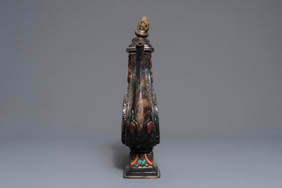 A silver-plated coral, jade and turquoise inlaid ewer and cover, Tibet or Mongolia, 19/20th C.