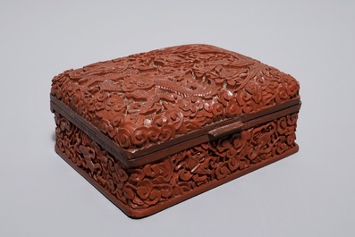 A Chinese ivory card case and a cinnabar lacquer box and cover, Qianlong mark, 19th C.