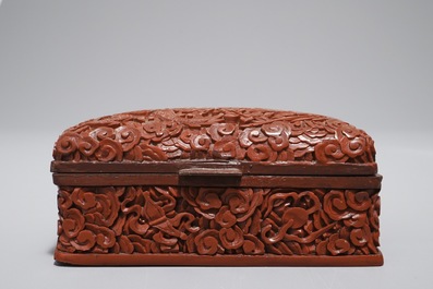 A Chinese ivory card case and a cinnabar lacquer box and cover, Qianlong mark, 19th C.