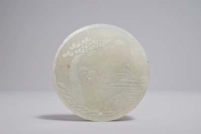 A Chinese green jade belt buckle, 19/20th C.