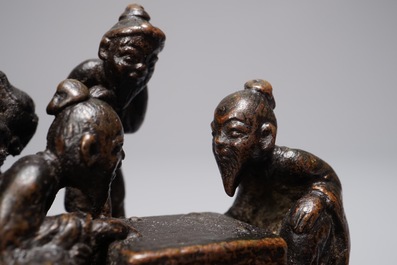 A Chinese bronze incense burner modelled as a mountain with qi-players, 18/19th C.