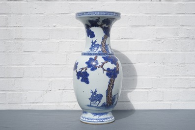 A Chinese blue, white and iron red vase with deer, 19/20th C.