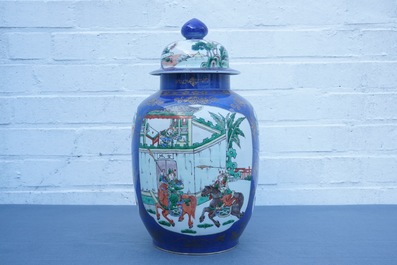 A Chinese famille verte on powder blue ground vase and cover, 19th C.