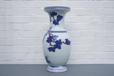 A Chinese blue, white and iron red vase with deer, 19/20th C.