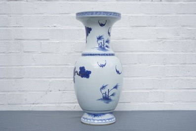 A Chinese blue, white and iron red vase with deer, 19/20th C.