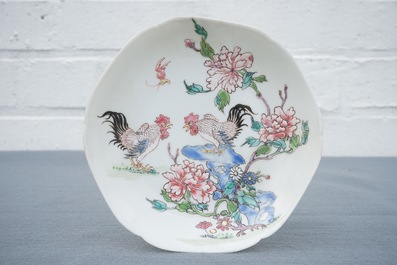 A fine Chinese famille rose cup and saucer with roosters, Yongzheng