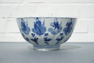 A Chinese blue and white moulded bowl with immortals, Chenghua mark, Kangxi