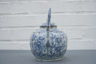 A Chinese blue and white kraak porcelain wine jug and cover with precious objects and flowers, Wanli