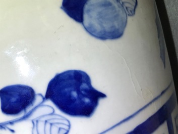 A pair of Chinese blue and white vases with ladies at a table, 19th C.