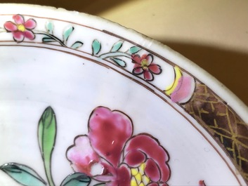 Une tasse et soucoupe en porcelaine de Chine famille rose ajour&eacute; et &agrave; double parois, Yongzheng