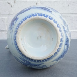 A Chinese blue and white jug with figurative design around, Transitional period