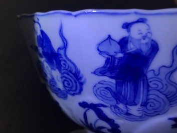 A Chinese blue and white moulded bowl with immortals, Chenghua mark, Kangxi