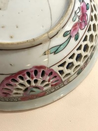 Une tasse et soucoupe en porcelaine de Chine famille rose ajour&eacute; et &agrave; double parois, Yongzheng