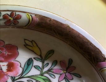 A reticulated double-walled Chinese famille rose cup and saucer, Yongzheng